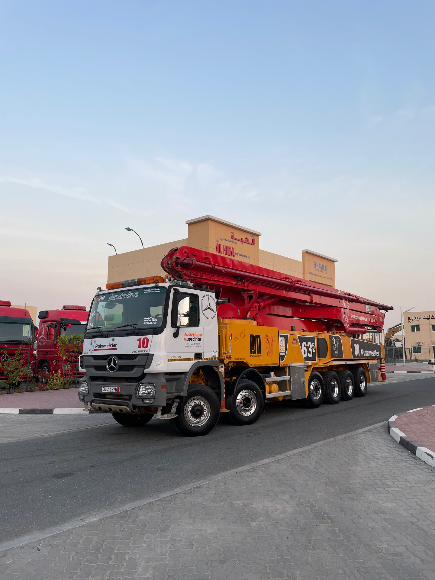 Mercedes-Benz Actros 6560 with Putzmeister M63-5 boom pump outside the ARDH AL HEBA showroom