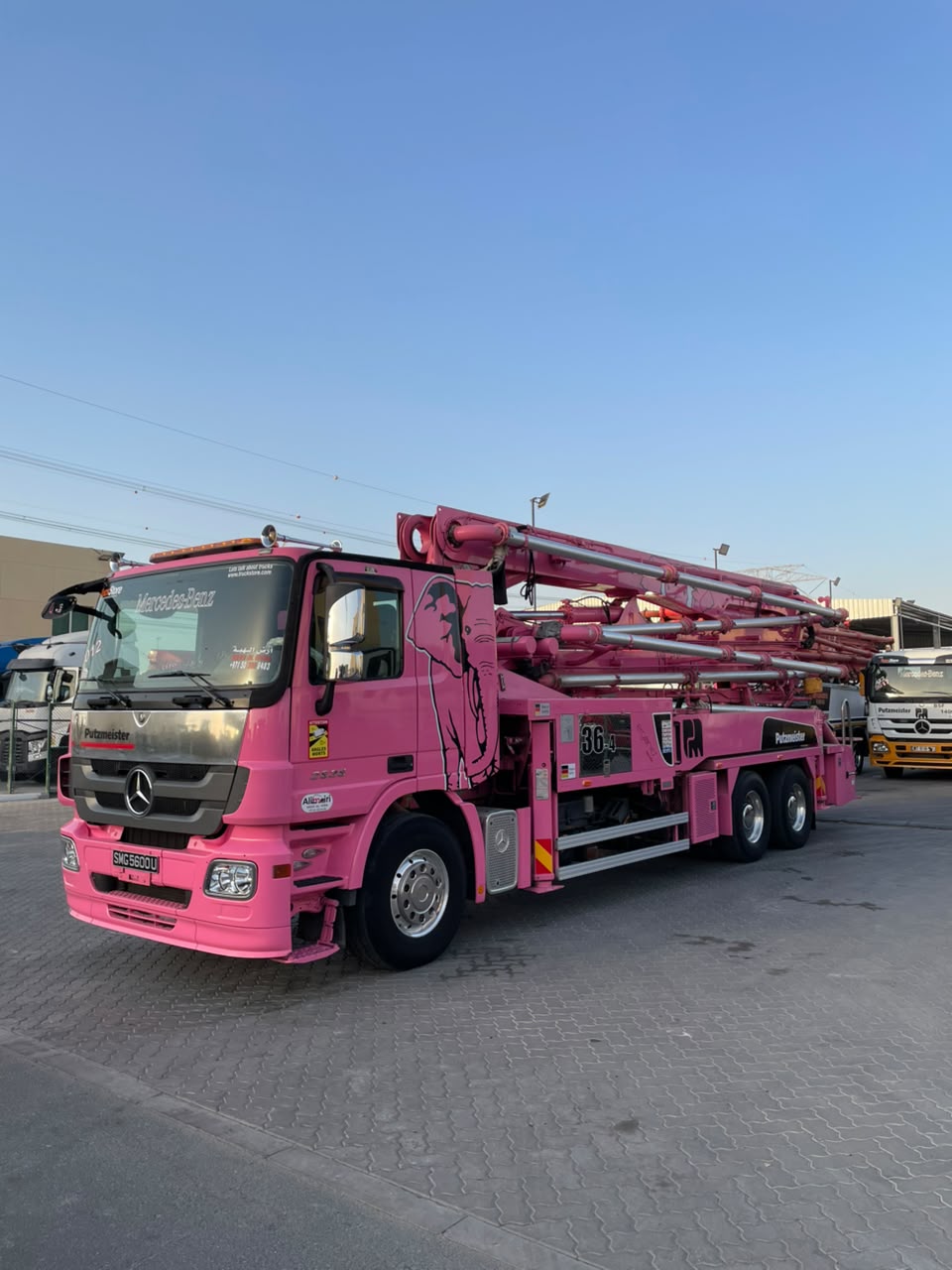 Pink Mercedes-Benz Actros with Putzmeister 36m concrete pump