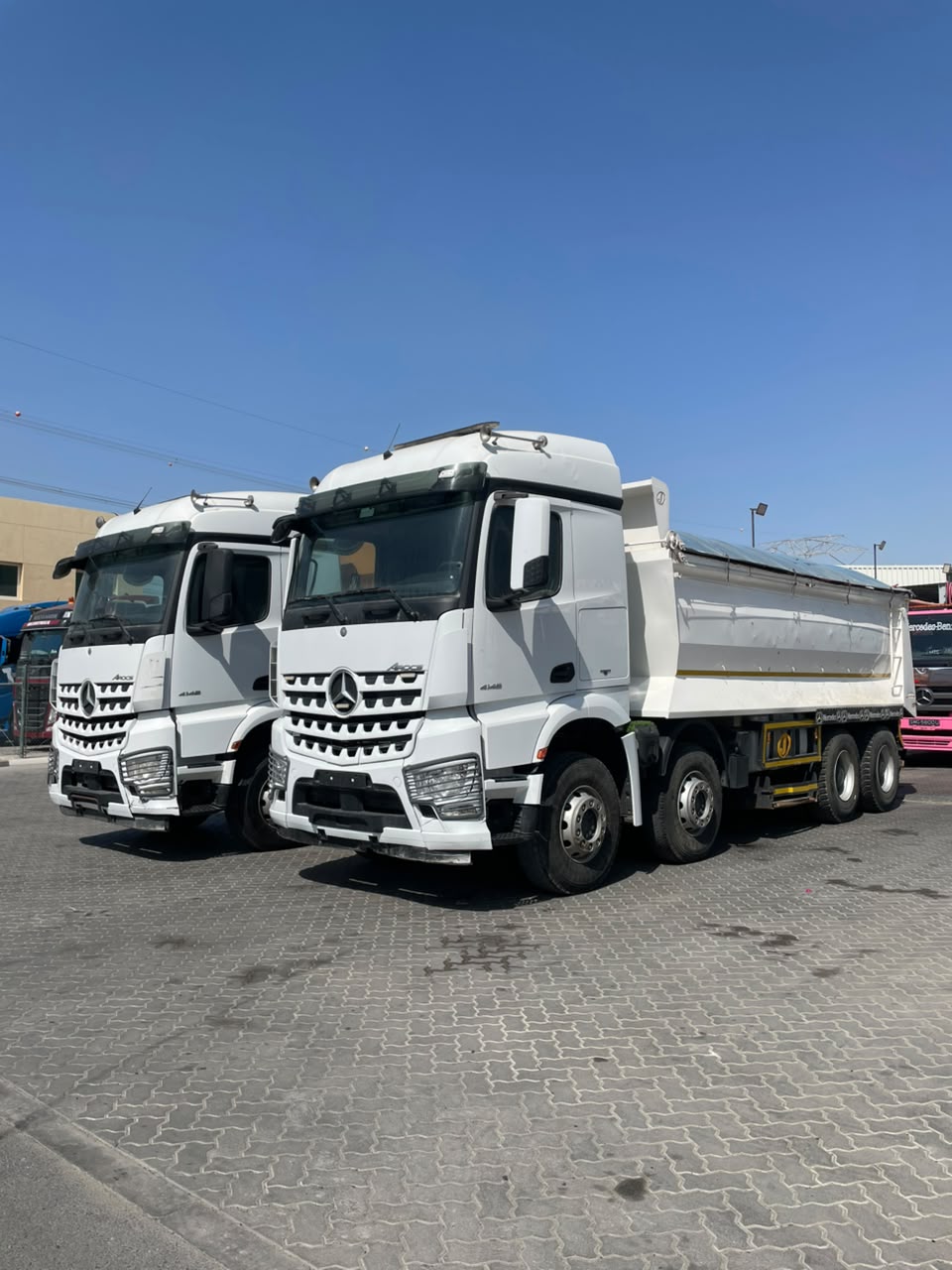 White Mercedes-Benz Arocs 4148 tipper trucks