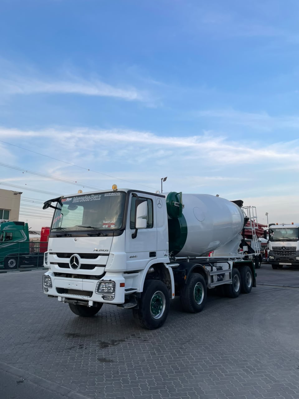 White Mercedes-Benz Actros 4441 concrete mixer truck